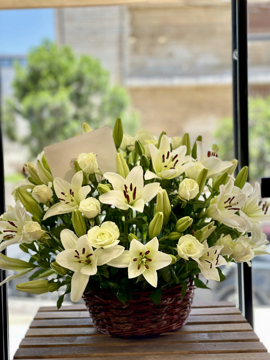 white lilium and roses basket