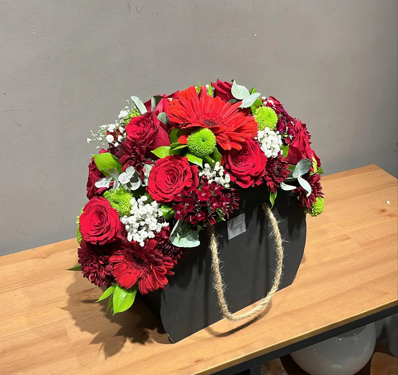 Red roses and Gerbera box Flowers Shop Amman Blooms Flowers