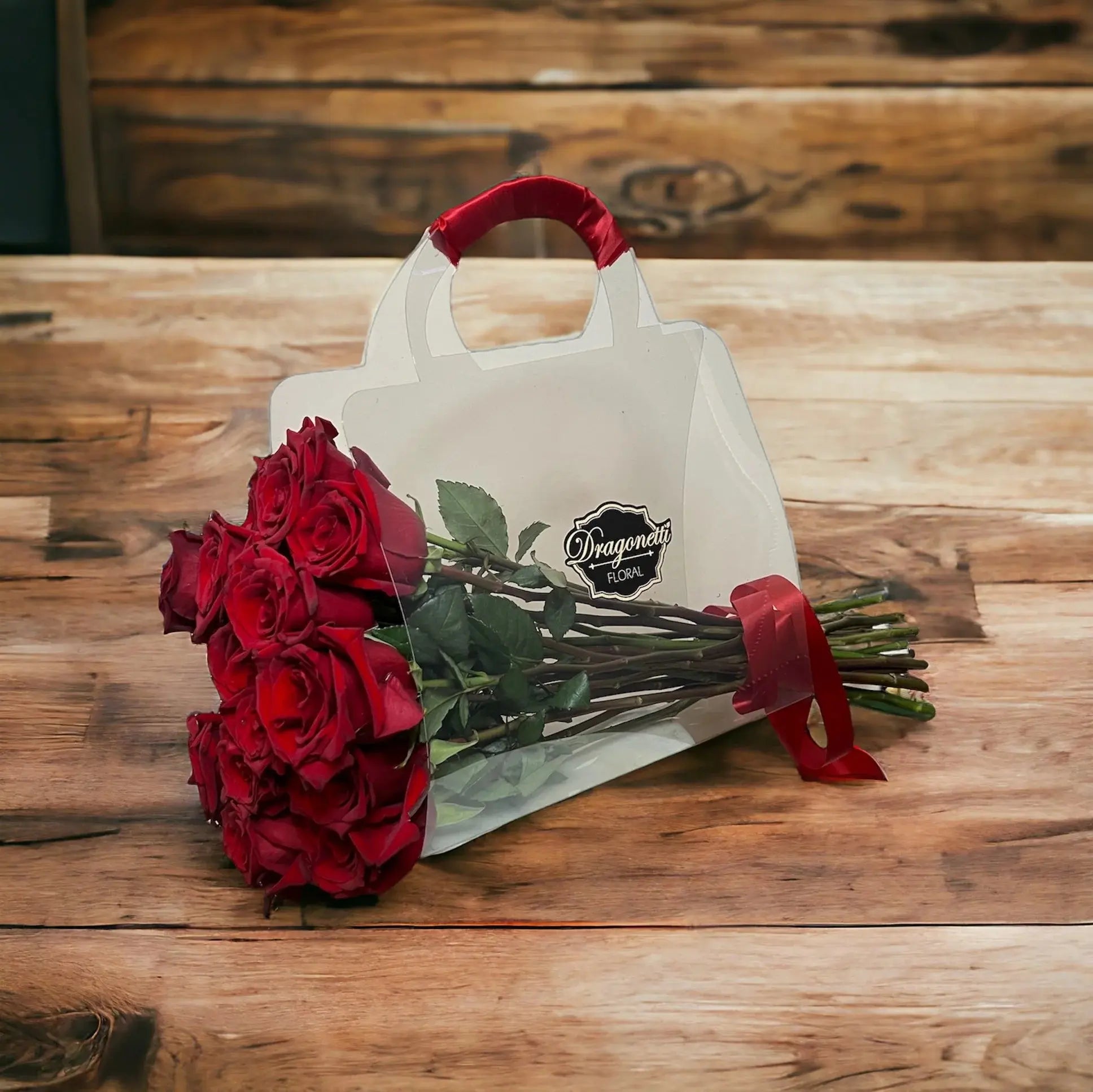 Red Roses In A Clear Acrylic Bag Flowers Shop Amman Blooms Flowers